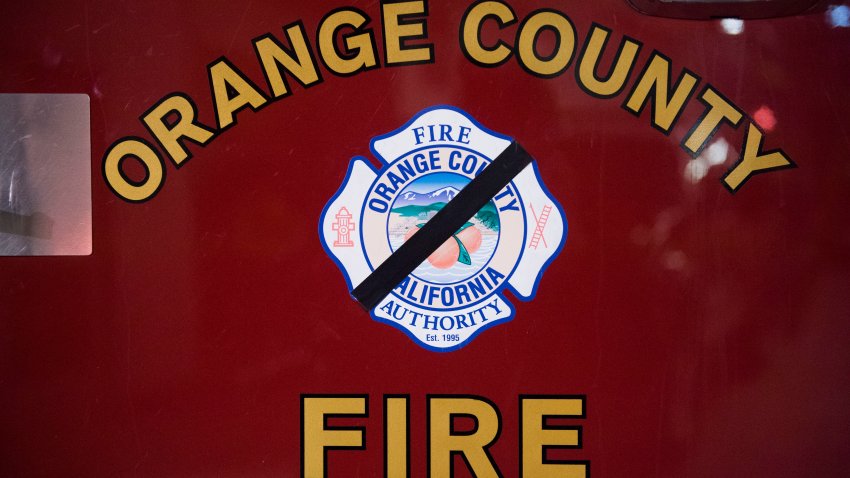 TUSTIN, CA – DECEMBER 19: A mourning band for Cal Fire’s Cory Iverson covers the OCFA crest on Engine 21 after the Orange County Fire Authority team returned from fighting the Thomas Fire in Ventura at Station 21 in Tustin on Tuesday, Dec. 19, 2017. (Photo by Kevin Sullivan/Digital First Media/Orange County Register via Getty Images)