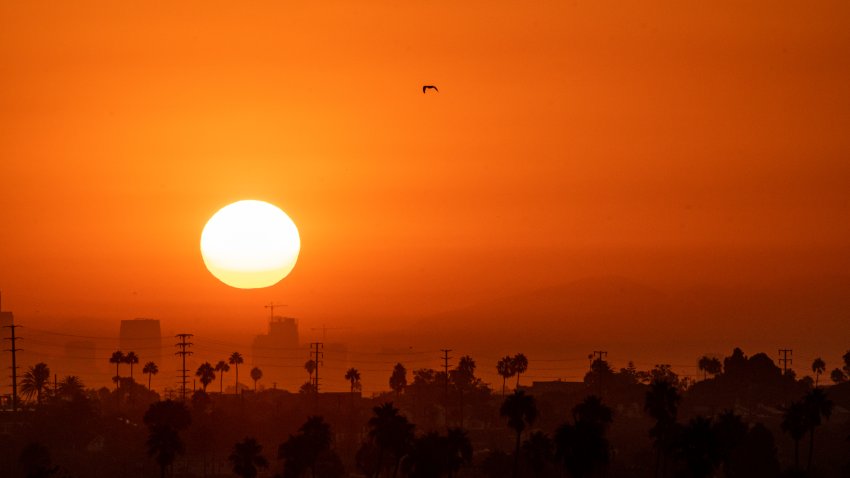 9/7/2022:   A hot summer sun rises over Los Angeles during the end of summer heatwave