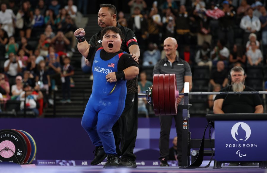 Gold medalist, Bonnie Bunyau Gustin of Team Malaysia celebrates following the Men's up to 72JG Final day nine of the Paris 2024 Summer Paralympic Games at Porte de La Chapelle Arena on September 06, 2024 in Paris, France