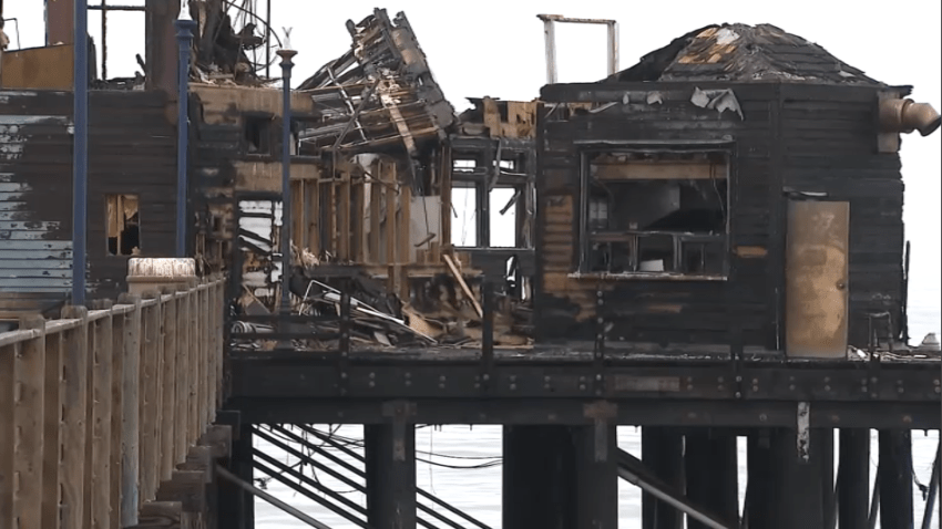 The iconic Oceanside Pier still shows the major damage from April’s fire that destroyed the west end of the structure.