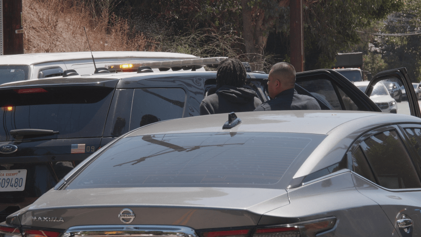 LAPD officers detained 2 men after a report of residential burglaries in Sherman Oaks Wednesday afternoon.