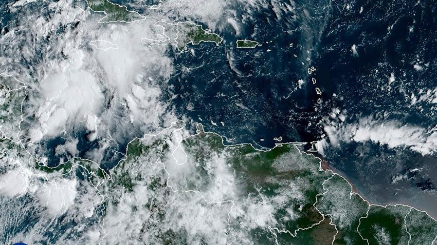 This image provided by the National Oceanic and Atmospheric Administration shows a cluster of storms located south of the Cayman Islands which are expected to strengthen in upcoming days, Monday, Sept. 23, 2024.