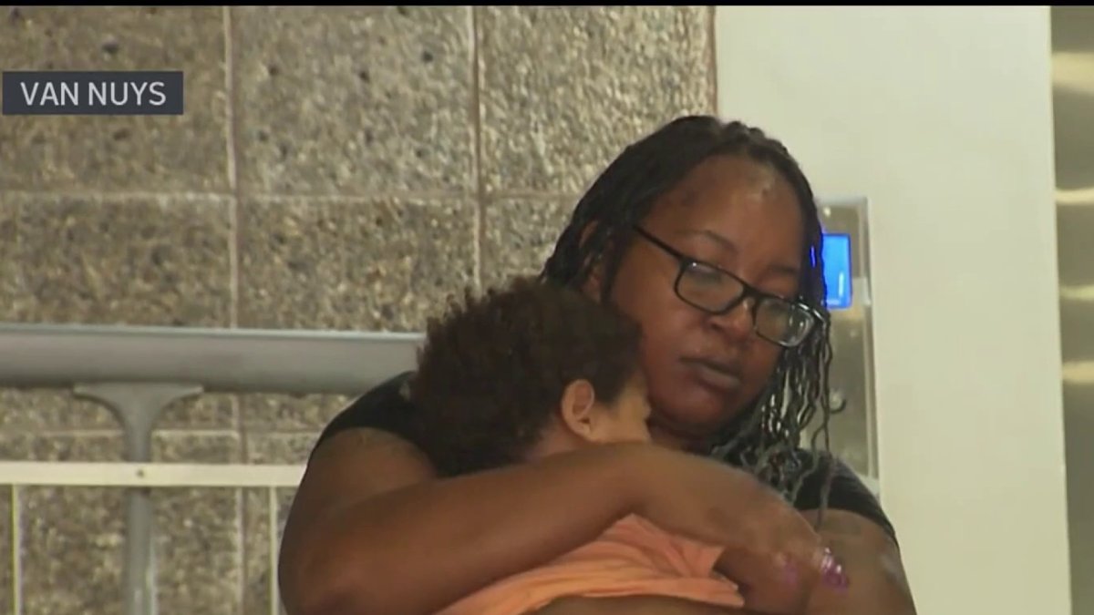 Toddler found alone in Van Nuys parking lot is reunited with family ...