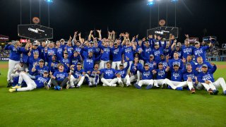 Sep 26, 2024; Los Angeles, California, USA;  The Los Angeles Dodgers team photo after clinching the National League West by defeating the San Diego Padres 7-2 at Dodger Stadium. Mandatory Credit: Jayne Kamin-Oncea-Imagn Images