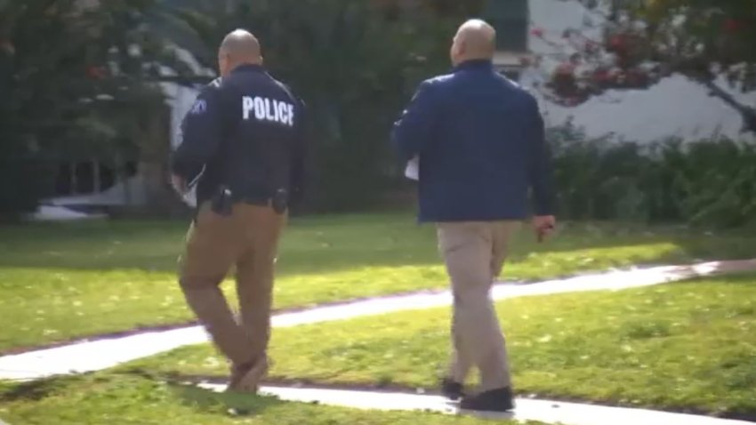 Investigators at the scene of a shooting in Los Angeles' Pico Robertson area in February 2023.