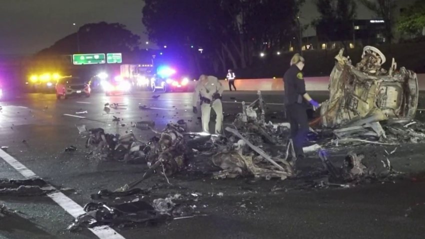 Burned wreckage of a vehicle at the scene of a deadly crash Monday Sept. 16, 2024 on Newport Beach.