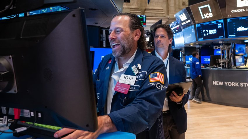 Traders work on the floor of the New York Stock Exchange on Aug. 14, 2024.