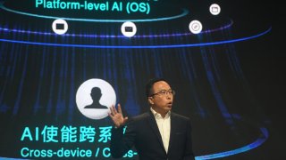 Chinese smartphone company Honor on Wednesday revealed new AI features. Pictured here is CEO George Zhao speaking in Shanghai on June 26, 2024.