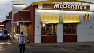 A customer walks out of a McDonald’s restaurant in Omaha, Nebraska, on Oct. 23, 2024.