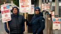 Boeing workers gather on a picket line near the entrance to a Boeing facility during an ongoing strike on October 24, 2024 in Seattle, Washington. 