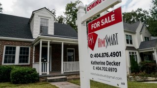 A “For Sale” sign in front of a home in Atlanta, Georgia, US, on Wednesday, Sept. 18, 2024. 