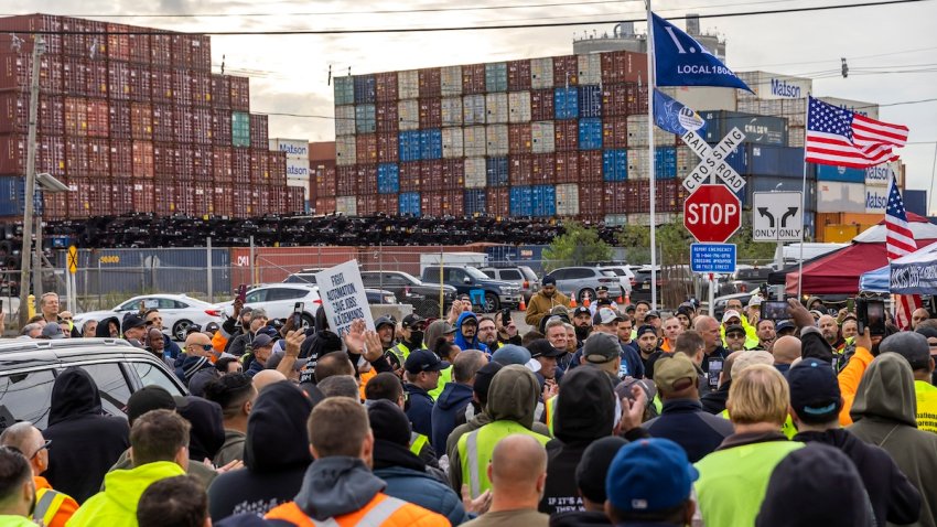 Workers take part in a port strike at Port Newark, Tuesday, Oct. 1, 2024, in Bayonne, N.J.