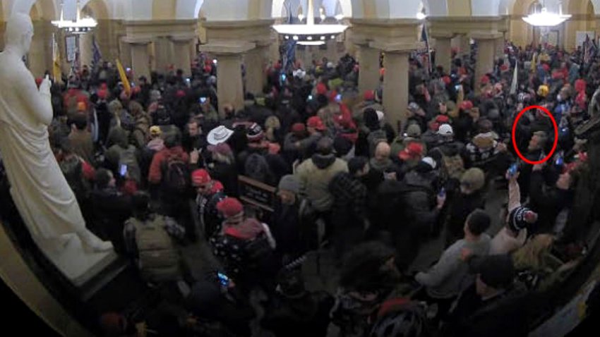 This image from security video of Michael Daniele, a retired New Jersey State Police trooper, seen in the Crypt in the U.S. Capitol on Jan. 6, 2021, was contained in the Justice Department affidavit and complaint in support of the arrest of Daniele.