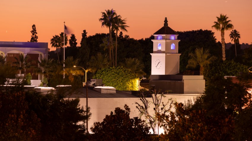 Sunset light shines on the historic downtown City Hall of Fullerton, California, USA.