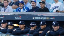 LOS ANGELES, CALIFORNIA - OCTOBER 25: (LR) Jim Gentleman, Jimmy Kimmel and Cleto Escobedo III look on during Game One of the 2024 World Series between the Los Angeles Dodgers and the New York Yankees at Dodger Stadium on October 25, 2024 in Los Angeles Angeles to , California. (Photo by Kevork Djansezian/Getty Images)