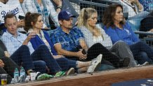 LOS ANGELES, CALIFORNIA – OCTOBER 25: Brad Paisley (C) looks on during Game 1 of the 2024 World Series between the Los Angeles Dodgers and the New York Yankees at Dodger Stadium on October 25, 2024 in Los Angeles, California. (Photo by Kevork Djansezian/Getty Images)