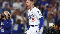 LOS ANGELES, CALIFORNIA – OCTOBER 25: Freddie Freeman #5 of the Los Angeles Dodgers celebrates after hitting a walk-off grand slam during the tenth inning against the New York Yankees during Game One of the 2024 World Series at Dodger Stadium on October 25, 2024 in Los Angeles, California. (Photo by Maddie Meyer/Getty Images)