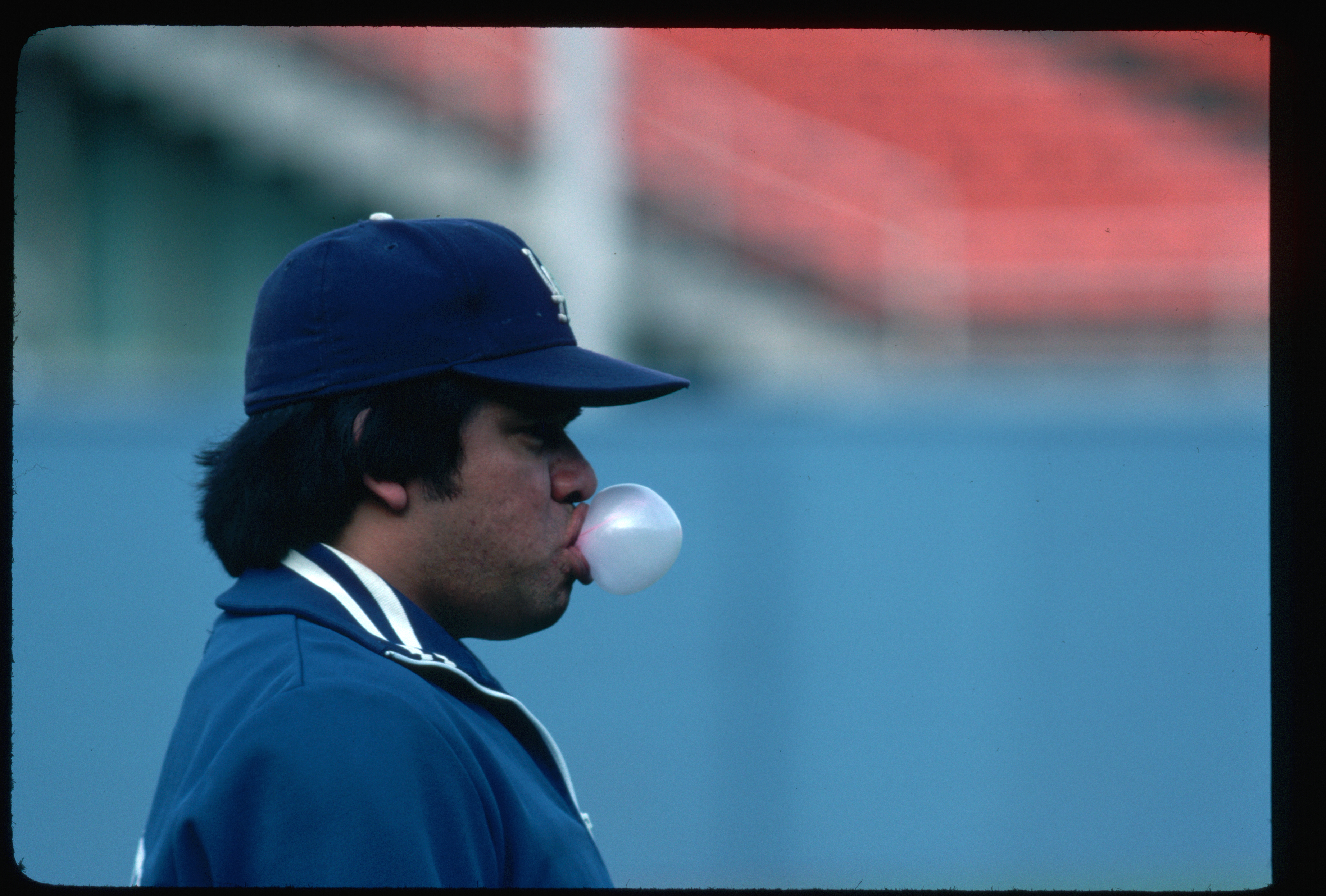 Fernando Valenzuela, pitcher for the Los Angeles Dodgers, blows a bubble during warmups in Dodger Stadium. 1981. (Photo by �� Vince Streano/CORBIS/Corbis via Getty Images)