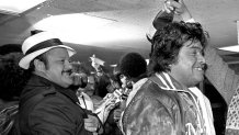 Oct 28, 1981, New York; USA; FILE PHOTO Los Angeles Dodgers scout Mike Brito (left), and Los Angeles Dodgers pitcher Fernando Valenzuela (right) celebrate in the clubhouse after winning the 1981 World Series against the New York Yankees at Yankee Stadium. Mandatory Credit: Jayne Kamin-Oncea-USA TODAY Sports