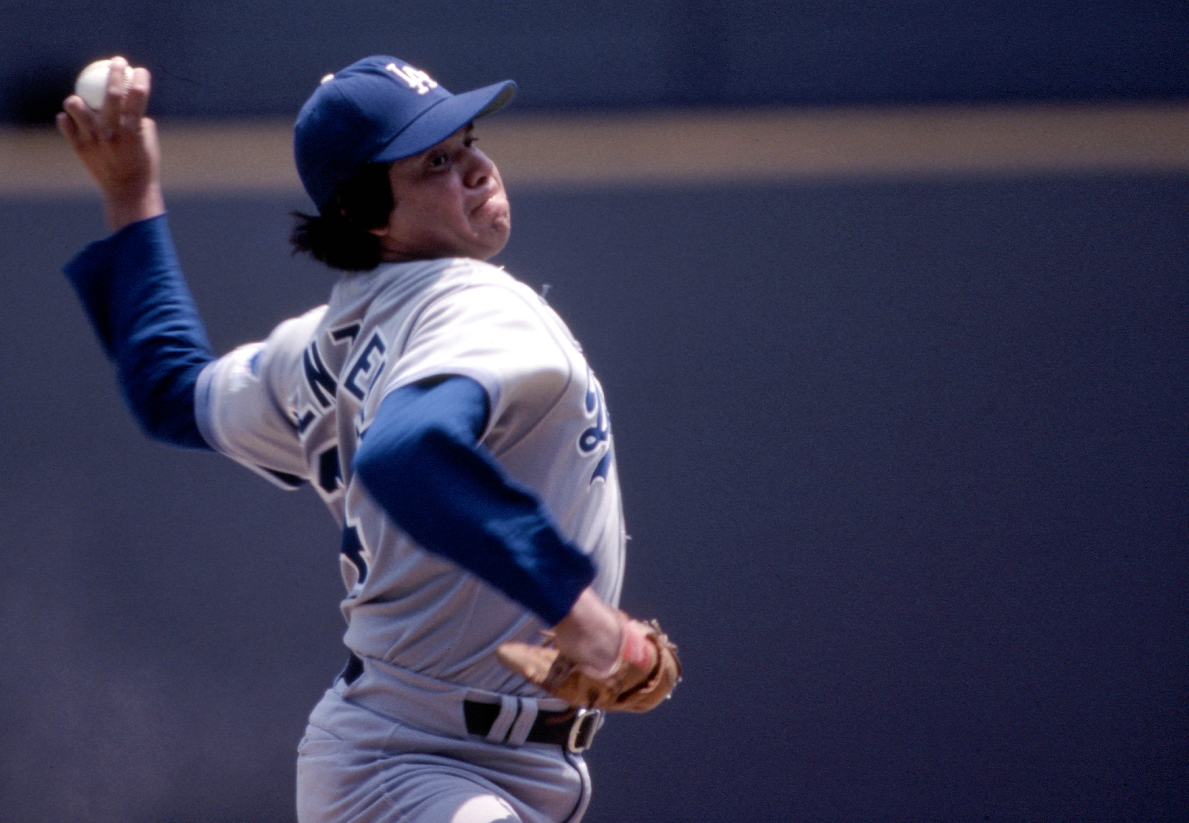 July 1983;  Cincinnati, OH,USA; FILE PHOTO; Los Angeles Dodgers pitcher Fernando Valenzuela delivers a pitch during against the Cincinnati Reds at Riverfront Stadium. Mandatory Credit: Malcolm Emmons-USA TODAY Sports