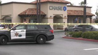 An Orange County Sheriff's Department SUV outside a Chase Bank Thursday Oct. 17, 2024.