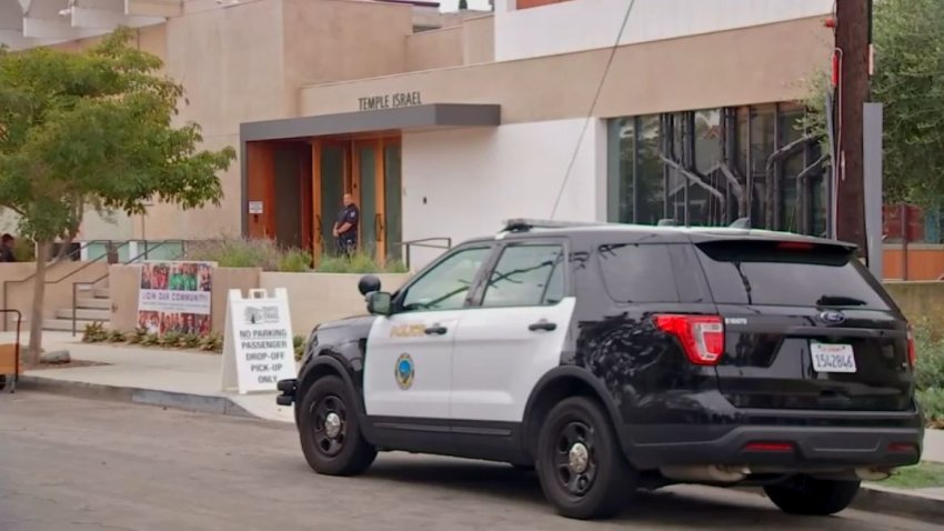 A police SUV is pictured outside Temple Israel.