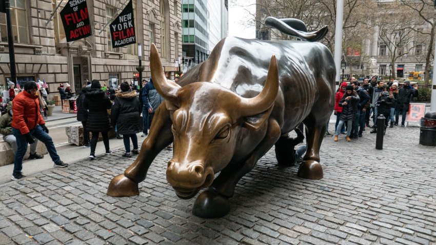 The Charging Bull bronze sculpture located on Broadway at the Financial District of Manhattan.