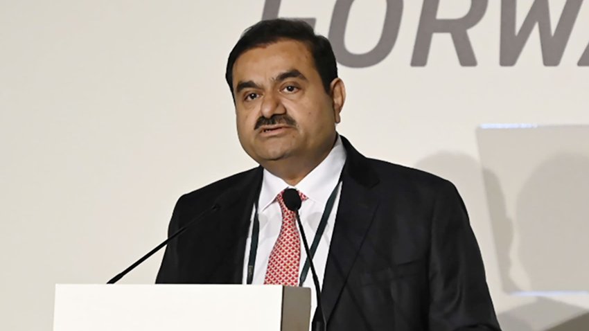 Gautam Adani, chairman of Adani Group, speaks during the Forbes CEO Summit in Singapore, on Tuesday, Sept. 27, 2022. India needs fossil fuels to serve large populations and getting rid of all fossil fuels instantly would not work for the nation, Adani said. Photographer: Edwin Koo/Bloomberg via Getty Images