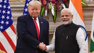 India’s Prime Minister Narendra Modi shakes hands with former U.S. President Donald Trump before a meeting at Hyderabad House in New Delhi on February 25, 2020.