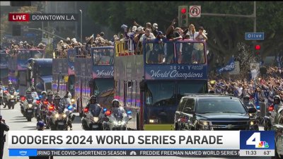 Dodgers championship parade: Part 1 — Buses begin route to Dodger Stadium