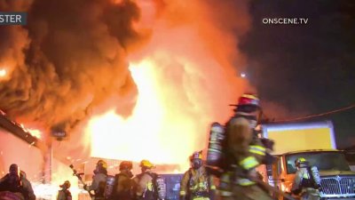 Large building fire prompts street closures in South LA