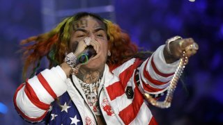 FILE- Rapper Daniel Hernandez, known as Tekashi 6ix9ine, performs during the Philipp Plein women’s 2019 Spring-Summer collection, unveiled during the Fashion Week in Milan, Italy, Sept. 21, 2018. (AP Photo/Luca Bruno, File)