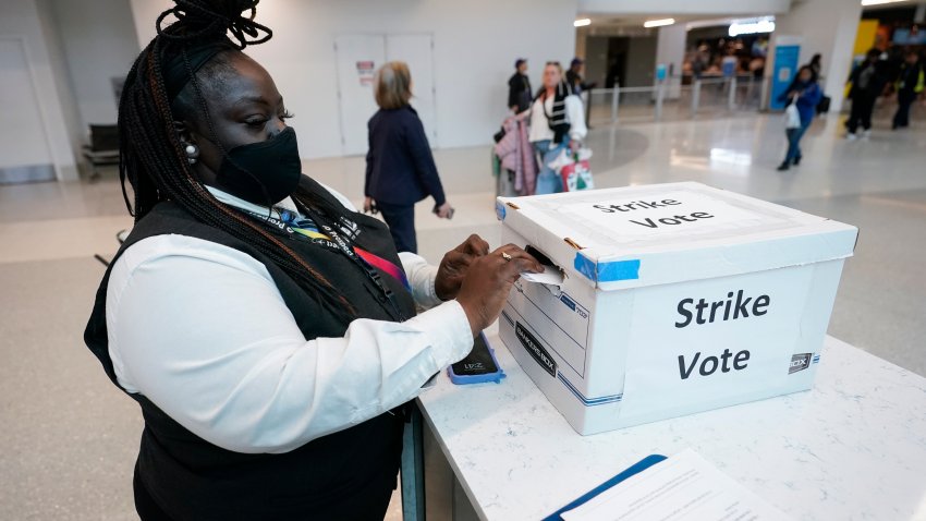 LaQuanda Harvey, a Prospect airport service worker, votes in favor of a strike at Charlotte Douglas International Airport, Friday, Nov. 22, 2024, in Charlotte, N.C. (AP Photo/Erik Verduzco)