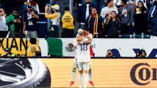 Los Angeles Galaxy’s Gabriel Pec, right, celebrates with teammate Marco Reus (18) after scoring during the second half of an MLS Semifinal Conference playoff soccer match against Minnesota United, Sunday, Nov. 24, 2024, in Los Angeles. (AP Photo/Etienne Laurent)