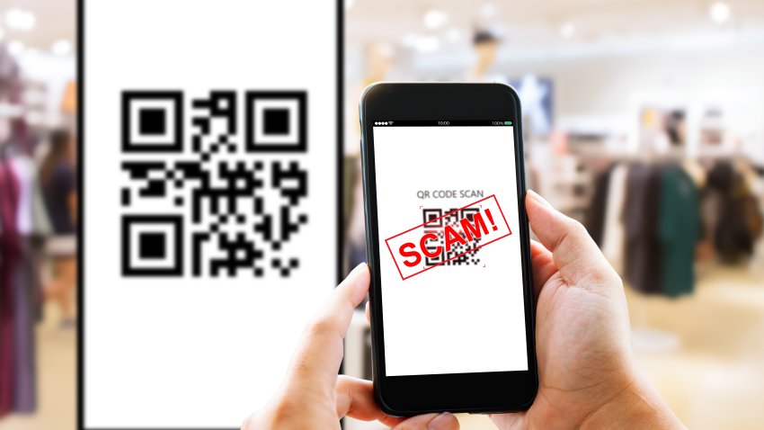 Man hands using smart phone to scan public Qr code