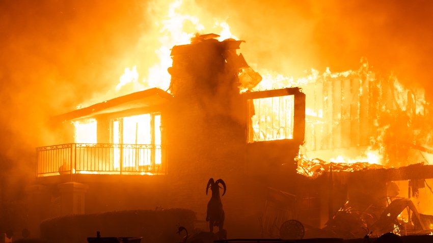 MOORPARK, CA – NOVEMBER 06: Flames engulf a structure during a fast-moving wildfire on November 6, 2024 in Moorpark, California. California is being lashed by powerful winds that fed the Mountain Fire, which destroyed homes and forced hundreds of residents to flee in Ventura County. (Photo by Qian Weizhong/VCG via Getty Images)