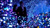 Couple looks at light-emitting diode illuminations ahead of Christmas in Tokyo, Japan