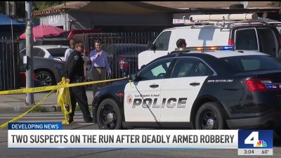 Two people on the run after armed robbery, shooting in Mid-City