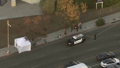 Woman found dead at bus stop in Mid-Wilshire