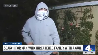 Victorville family's home security camera captures armed man outside front door