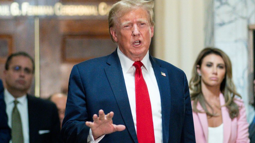 FILE – Former President Donald Trump speaks after exiting the courtroom for a break at New York Supreme Court, Dec. 7, 2023, in New York.    Trump has secured a bond sufficient to support an $83.3 million jury award granted to writer E. Jean Carroll during a January defamation trial stemming from rape claims she made against Trump, his lawyer said Friday, March 8, 2024, as she notified the federal judge who oversaw the trial that an appeal was underway.(AP Photo/Eduardo Munoz Alvarez, File)