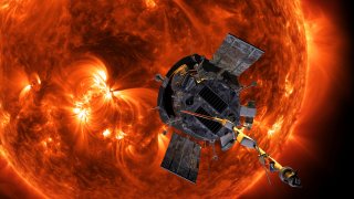 FILE – This image made available by NASA shows an artist’s rendering of the Parker Solar Probe approaching the sun.