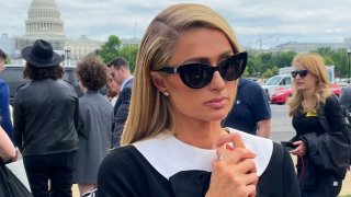 FILE – Paris Hilton meets with a supporters after speaking at a Stop Institutional Child Abuse, May 11, 2022 in Washington.