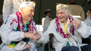 FILE: One Hundred-year-old Veteran Warren Upton (left), from the USS Utah, wishes happy birthday to Pearl harbor survivor Navy Chief Joseph Mariani, who turns 100 on December 12th, 2019. Upton, the oldest survivor of the attack, died at 105 years old.