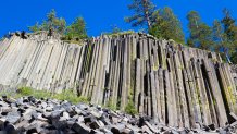 Outstanding Formation of Columnar Basalt. The 60-foot-high sheer wall was exposed during the last glaciation. National Monument near Mammoth Lakes, California.