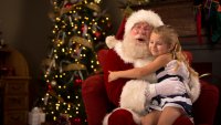 Santa Claus hugging a child