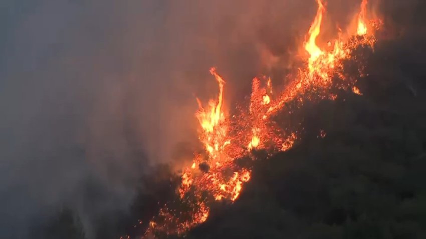 The Franklin Fire burns brush in Malibu on Tuesday, Dec. 10, 2024.