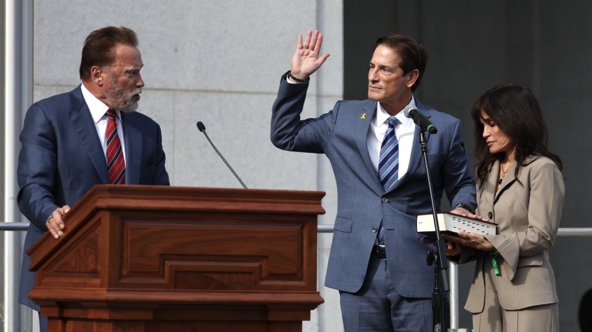 Los Angeles County's new top prosecutor Nathan Hochman is sworn into office by former Gov. Arnold Schwarzenegger.