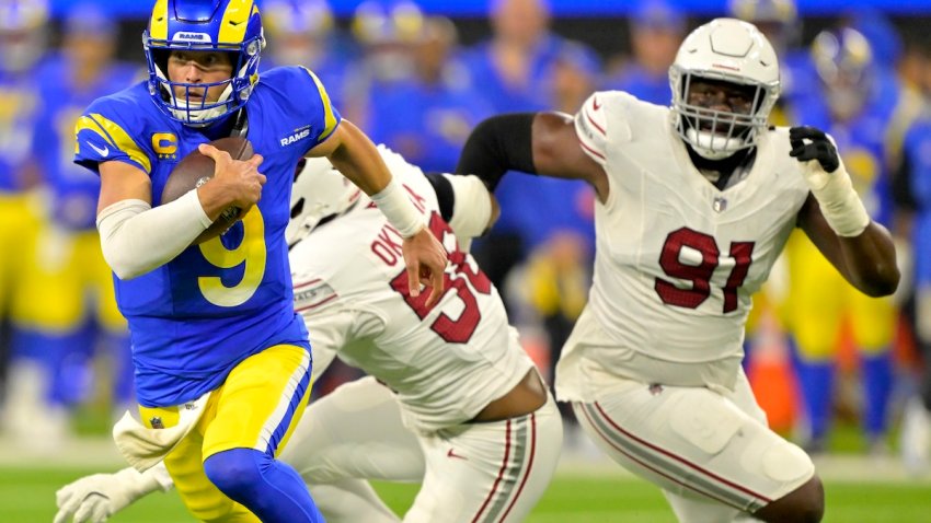 Dec 28, 2024; Inglewood, California, USA;   Los Angeles Rams quarterback Matthew Stafford (9) runs for a first down against the Arizona Cardinals at SoFi Stadium. Mandatory Credit: Jayne Kamin-Oncea-Imagn Images