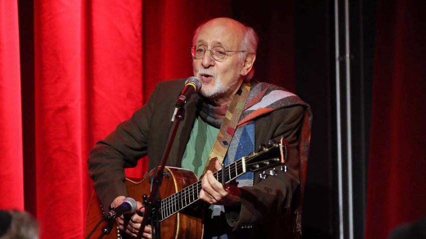 Peter Yarrow performing a song.